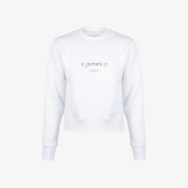 The white female cropped sweatshirt by the designer brand z.james.c. featuring a cropped fit and logo print on the chest