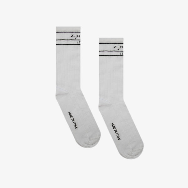 White ribbed socks featuring the logo of the designer fashion brand z.james.c